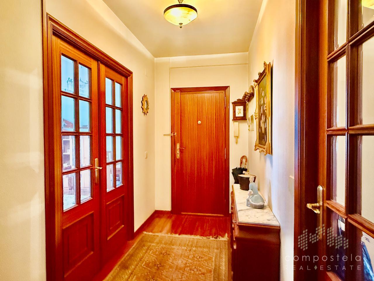 Hall, acogedor y amplio