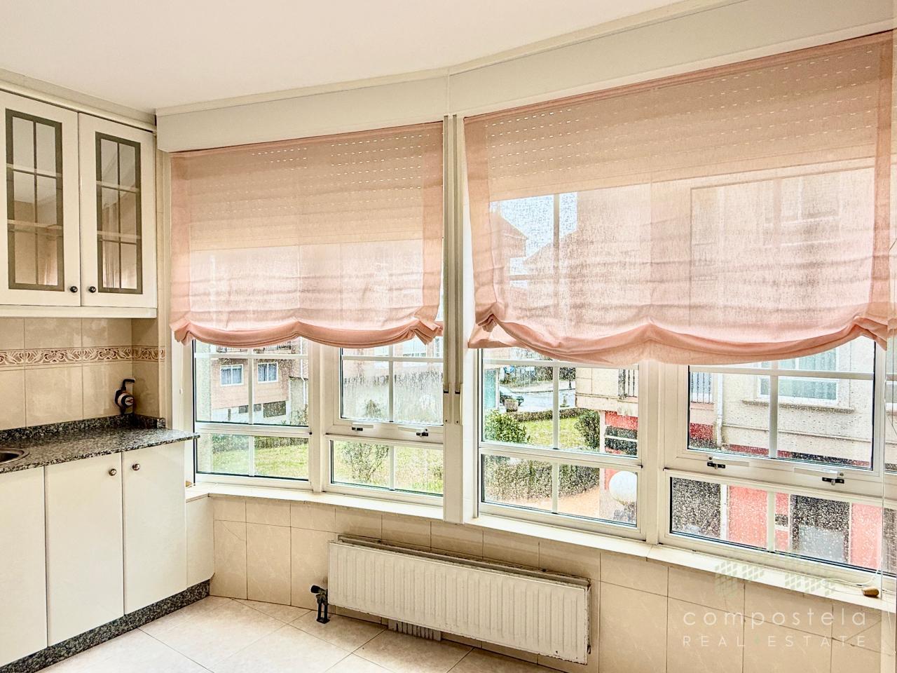 Galería en cocina, luz natural, vistas